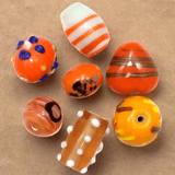 50+ Fancy Beads Orange 8-25mm