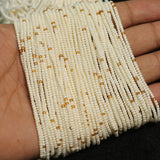 10 Strings, 11`0 Preciosa Seed Beads