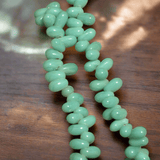 1 string 10x6mm of Glass Drop Beads Teal