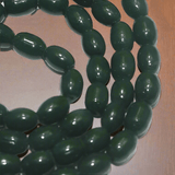 1 String 6x4mm Jaipuri Beads Dark Green Oval