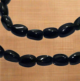 4 Strings Fire Polish Twisty Oval Beads Black 6x4 mm